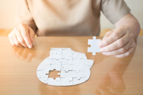 Brain puzzle Elderly main with brain puzzle